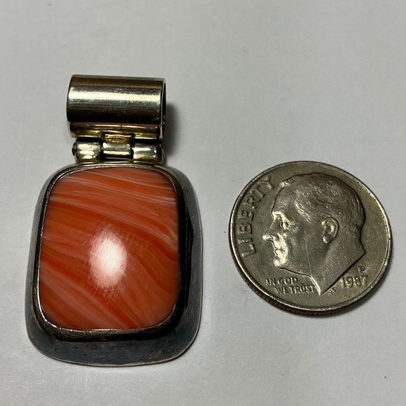 Sterling Silver Mexican Pendant with a Coral Stone. 1 3/8 inches long - Picture 2 of 4